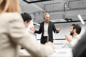 Office employees having meeting in conference room