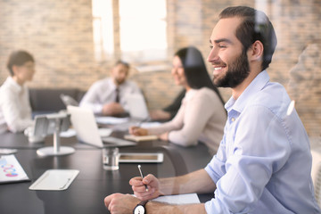 Young man working in office. Finance trading