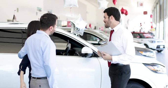 Man selling cars in a dealership
