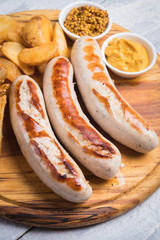 German sausages with mostard and fried potato