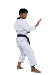 Master Black Belt TaeKwonDo handsome man instructor Teacher fighter show hit pose, studio lighting white background isolated.  White formal fighting suit, motion blur hand foots on taekwondo post.