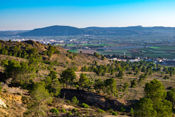 Fototapeta na wymiar Aerial view of town under the mountain. Orihuela, Spain.