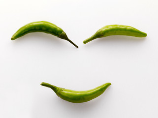 Smile emoji made up of chili