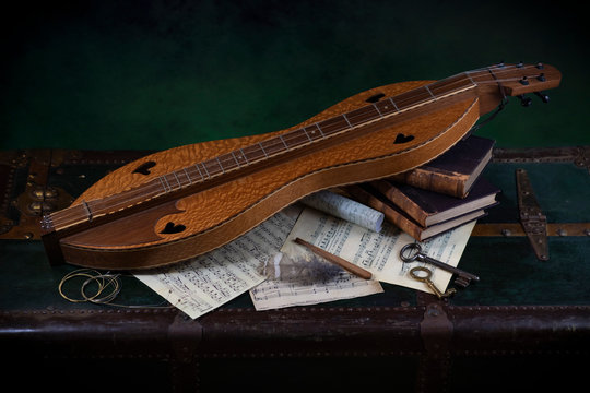 Still Life With Appalachian Dulcimer And Music Notes