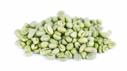 Green coffee beans, isolated on white background. Medium green peaberry coffee beans.