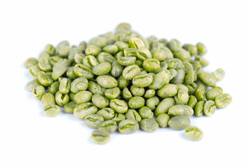Green coffee beans, isolated on white background. Medium green peaberry coffee beans.