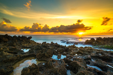 Obraz premium Rock with sunset background.