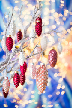Christmas greeting card. Pine decoration on bokeh background. New Year concept. Copy space.