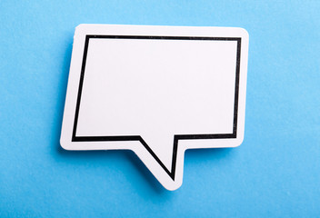 Blank Speech Bubble Isolated On Blue