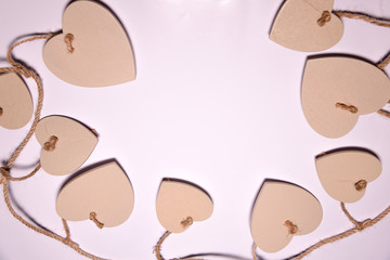 Wooden hearts shape on white blackground . Valentines Day background , wedding day