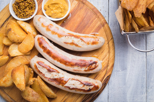 German sausages with mostard and fried potato