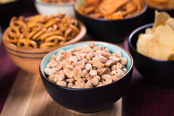 Salty snacks served in bowls