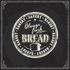 Vector bakery logo design elements template on vintage blackboard texture