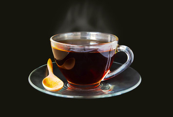 Cup of tea isolated on black background