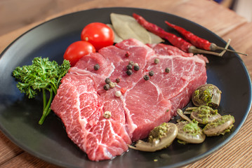 raw meat ingredients on a plate