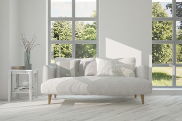 White stylish minimalist room with sofa and smmer landscape in window. Scandinavian interior design. 3D illustration