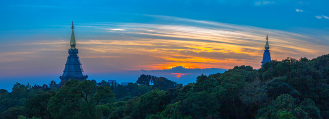 sunset on Phra Mahathat Nopamethaneedol And Phra Mahathat Nopaphon Phum Siri Located at the top of Doi Inthanon Chiang Mai Thailand.