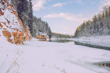 Red rocks and river Gauja. Many snow at winter 2019. Travel photo.