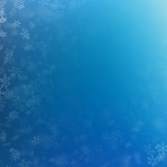 Obraz premium Light blue abstract Christmas background with white snowflakes. EPS 10