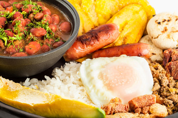 Traditional Colombian dish called Banda paisa: a plate typical of Medellin that includes meat, beans, egg and plantain