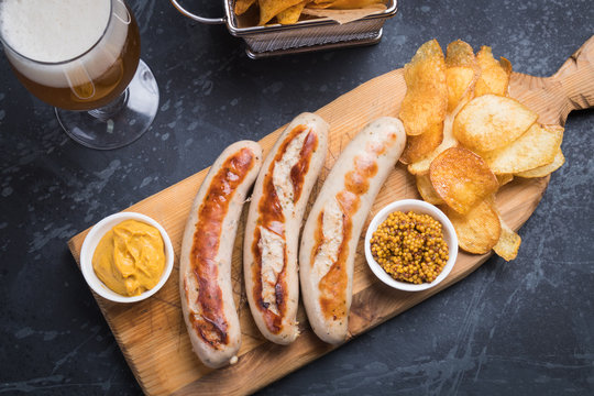 German sausages with mostard and fried potato