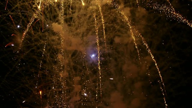 Tons of fireworks light up the night sky. 4K