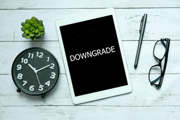 Business concept. Top view of clock,plant,tablet,glasses,pen and tablet written with Tablet on...