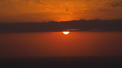Fototapeta premium Sunset, sunrise with clouds. orange skies and sun