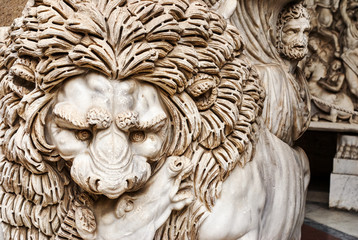 Marble sculpture of lion close-up. Fragment antique roman sculpture in Rome, Italy