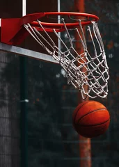 Zelfklevend Fotobehang the ball in the basketball Hoop  © денис климов