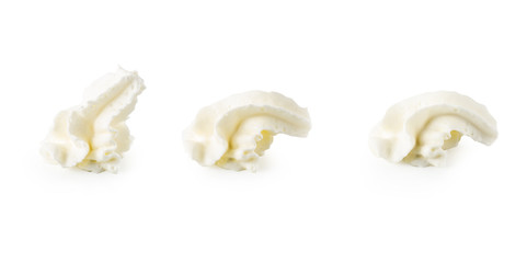 whipped cream isolated over the white background