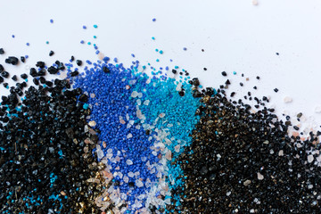 Layered colorful sand pattern. Marble style background. Blue and gold powder texture.