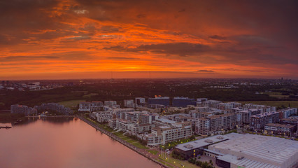 Orange sunset overlooking Wentworth Point in Sydney. Waterfront properties.