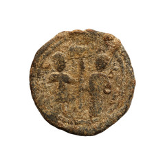 Ancient copper or bronze byzantine coin isolated on white