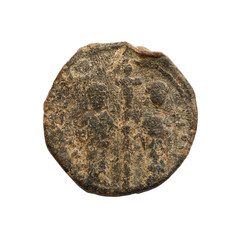 Ancient copper or bronze byzantine coin isolated on white