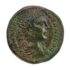 Ancient copper or bronze roman coin isolated on white