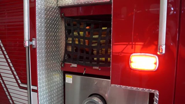 Code 3 emergency lights on the side of a fire engine