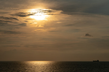 Fototapeta na wymiar The Sunrise over the horizon:the view from the ship