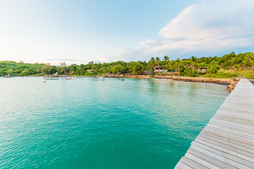 Wood bridge idyllic  sea beach turquoise water