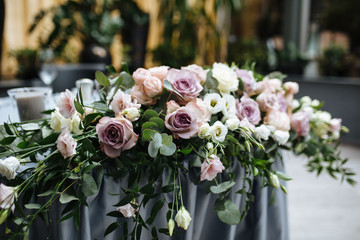 Amazing banquet in gray colors for wedding day with pink flowers