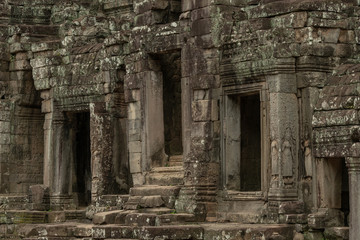 Three doorways in ruins of Bayon temple