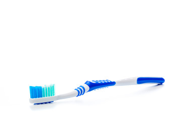 colored toothbrush on an isolated background, close up