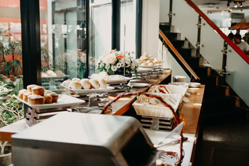 table with plates and cutlery on table in restaurant