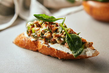 slice of bread with cream cheese and eel