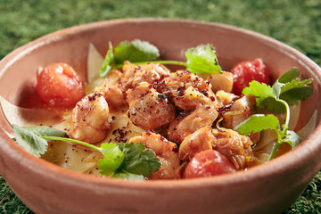 Azeri Guru Hinkal Pasta with Chicken and Tomatoes on Natural Moss and Wood Background