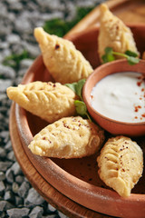 Azerbaijani Fried Dumplings Giurza with Minced lamb Meat also known as Gyoza