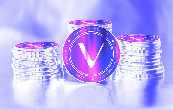 Vechain (VEN) digital crypto currency. Stack of coins. Cyber money.