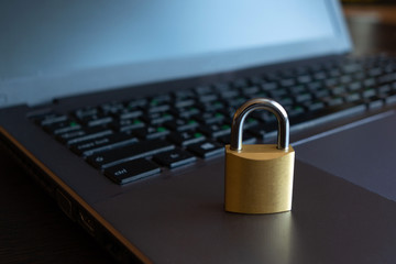 cyber safety concept, lock on laptop computer
