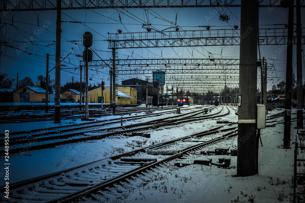 Wall mural train on the railway in winter