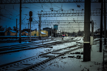 Fototapeta na wymiar Train on the railway in winter